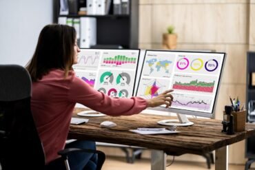 A picture containing text, person, indoor, table Description automatically generated