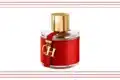 A striking red perfume bottle featuring gold lettering, labeled "CH Fragrances."