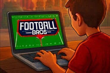 A boy plays Football Bros Unblocked on his laptop, focused and enjoying the game.