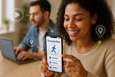 A woman using her smartphone to access the SosoActive fitness app, focused and engaged in her workout routine.