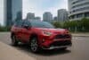 Best Hybrid SUV Toyota RAV4 Prime parked in a modern city environment.