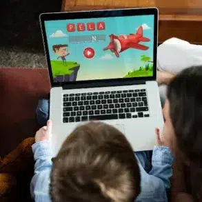 Children playing educational games on Sheppard Software platform.