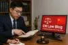 A lawyer reviews a book while pointing to information on a screen displaying "CN Law Blog" and a Chinese flag. A gavel rests on the desk.