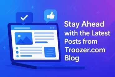 A laptop illustration displaying a blog interface with messages about staying updated on Troozer.com blog posts.