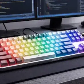 MageGee Keyboard on a developer desk setup with Visual Studio and ergonomic wrist posture