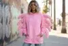 pink palm puff hoodie oversized streetwear look with puff print logo in pastel pink for 2026 fashion trend