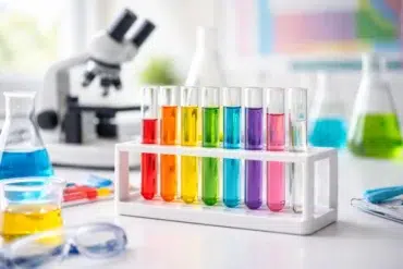 Test Tube Rack setup for students with labeled test tubes on a clean lab bench