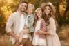 Clothing Ideas for Family Photoshoot showing coordinated trendy color combinations for a modern family portrait