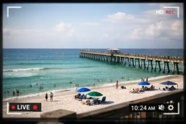 Navarre Beach Cam live view showing surf, sky, and beach conditions today