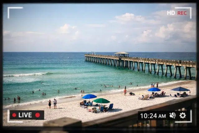 Navarre Beach Cam live view showing surf, sky, and beach conditions today