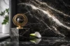 Marmol Negro Brasil black marble slab used in a modern kitchen island