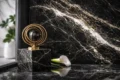 Marmol Negro Brasil black marble slab used in a modern kitchen island