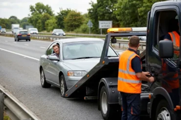 Tow Truck Near Me roadside assistance helping a broken down car on the side of the road