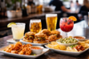 Cheesecake Factory Happy Hour appetizers and drinks served in the bar area during weekday happy hour