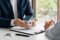 First-time buyer reviewing paperwork for Framework Homeownership Making an Offer Answers before submitting a home purchase offer