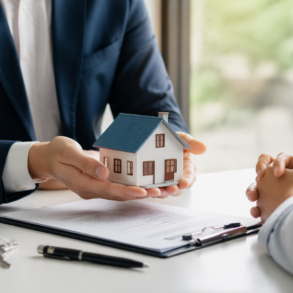First-time buyer reviewing paperwork for Framework Homeownership Making an Offer Answers before submitting a home purchase offer