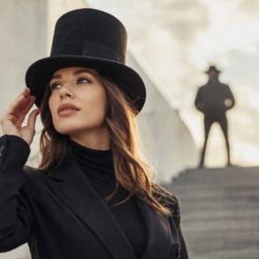 Higher Hat fashion trend featuring a bold, structured tall-crown hat styled with a modern outfit