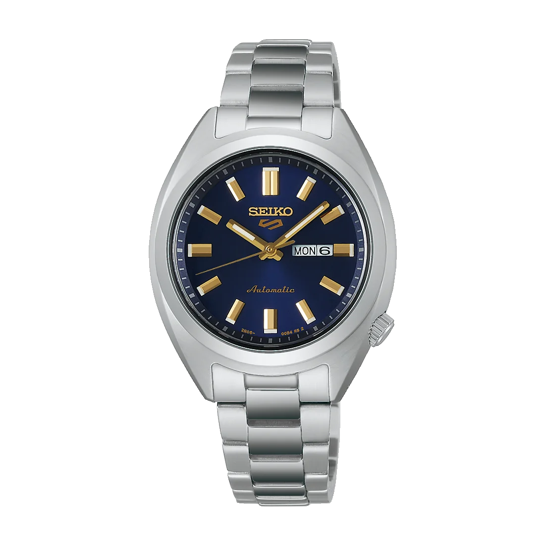 A silver metal Seiko watch with a blue dial, gold hour markers, and hands, displaying the day and date. The tone is elegant and sophisticated.