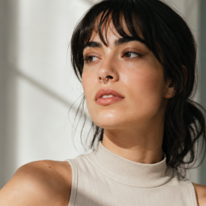 Stylish person wearing modern Septum Rings with a clean fashion look and confident expression