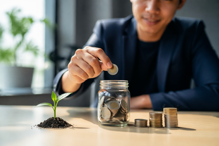 Startup Booted Fundraising Strategy concept showing founders planning smart capital raising steps