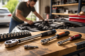 Torque wrench sizes and types for home and garage projects on a workbench with sockets and automotive tools
