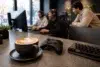 Cafeterías Gourmet Series Online Torneos de Esports gaming café with players competing in an online tournament