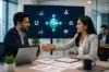 Two business professionals shake hands in an office, smiling. A digital presentation screen shows various business icons. Teamwork and success theme.