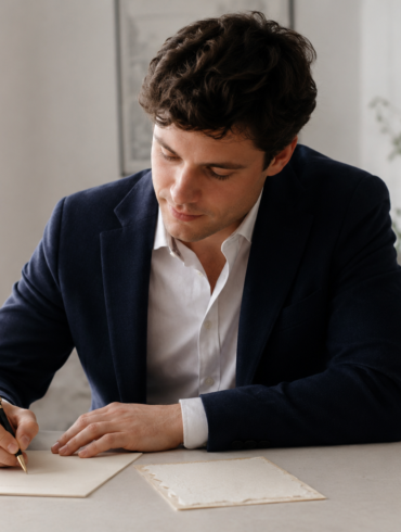 Fancy English Translator tool turning simple words into stylish English on a digital writing screen