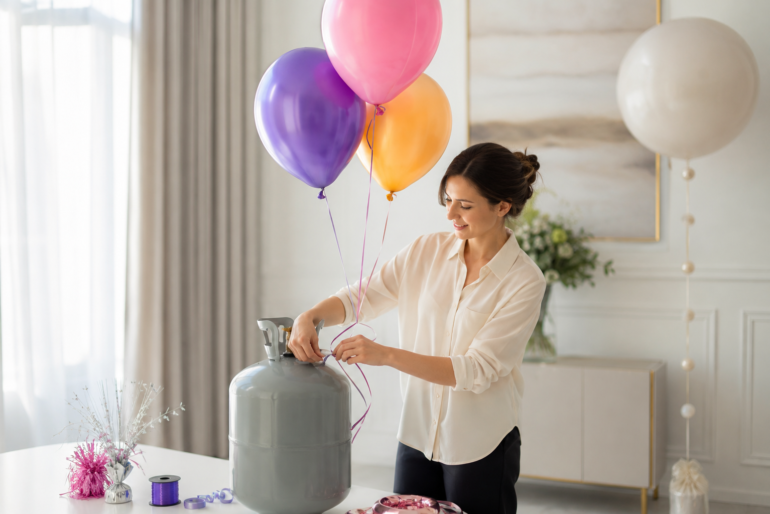 Helium Tank used to fill colorful balloons for a birthday party setup