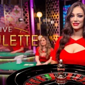 A smiling woman in a red dress stands beside a roulette table, exuding a lively casino atmosphere. The text "Live Roulette" is displayed prominently.