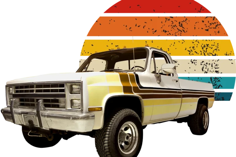 Vintage white pickup truck with brown stripes in front of a retro sun graphic with horizontal stripes in orange, yellow, and blue on a black background.