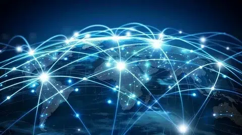 Digital rendering of Earth viewed from space, with glowing lines and nodes connecting various points, symbolizing global communication networks.