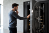 A person checking online safety and privacy settings before visiting R34 Vault or similar online vault websites