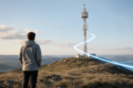 Radio Bearer concept showing a smartphone connected to a 5G mobile network tower with wireless data signals