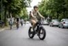 Ridstar Q20 fat tire electric bike on a city road with outdoor riding background