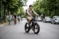 Ridstar Q20 fat tire electric bike on a city road with outdoor riding background