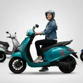 Woman in a helmet riding a teal Chetak electric scooter, with other scooters in various colors behind her.