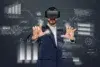 Man wearing VR headset interacts with futuristic data interfaces displaying charts and statistics.