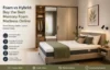 A memory foam mattress is displayed on a bed in a modern bedroom with a wardrobe and artwork.
