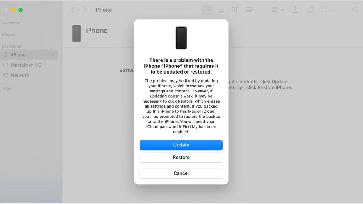 Mac screen showing a prompt to update, restore, or cancel due to a problem with the connected iPhone requiring update or restore.