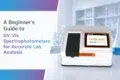 Image of a UV-Vis spectrophotometer in a lab with text reading 'A Beginner's Guide to UV-Vis Spectrophotometers for Accurate Lab Analysis.' Modern, scientific ambiance.