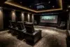 Luxurious home theater with plush recliners facing a large screen displaying a city skyline.