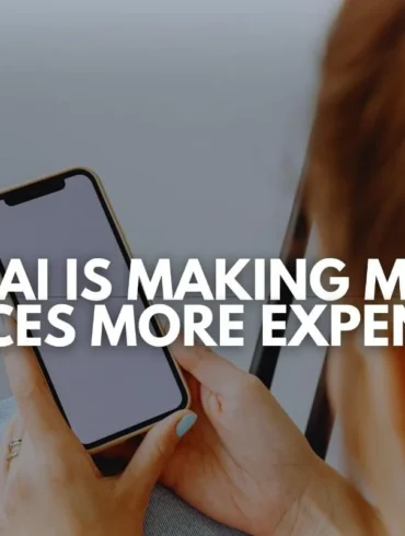 Person holding a smartphone with text overlay "HOW AI IS MAKING MOBILE DEVICES MORE EXPENSIVE".