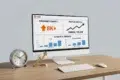 Desktop setup featuring a Reddit analytics dashboard on a computer screen, with charts for community impact, profile growth, and strategic results, alongside a clock and golden arrow.