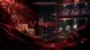 Luxury shopping bags, a handbag, dress shirts, and watches are displayed in a dimly lit, opulent setting with red velvet.